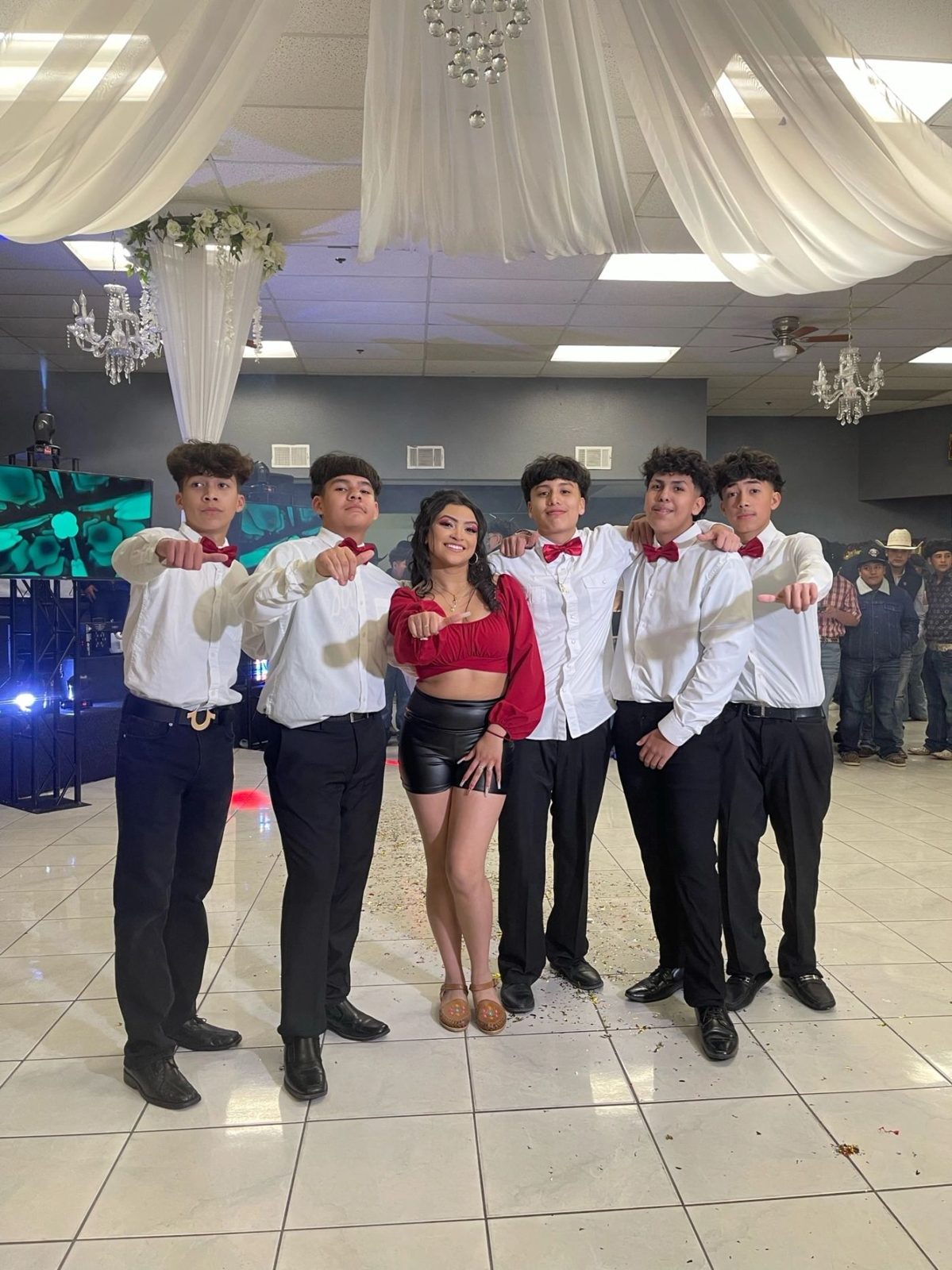 Court mid surprise dance in a decorated ballroom