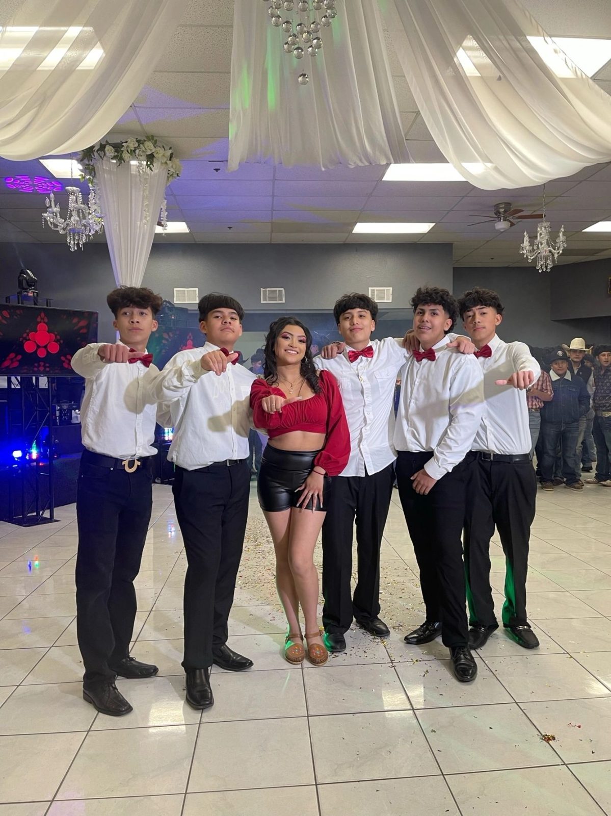 Surprise dance performance under event lighting
